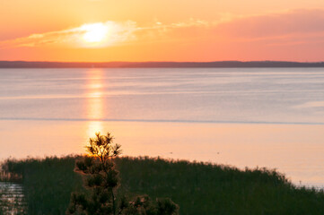 Fototapeta na wymiar Sunset over Sniardwy lake in Poland, Mazury