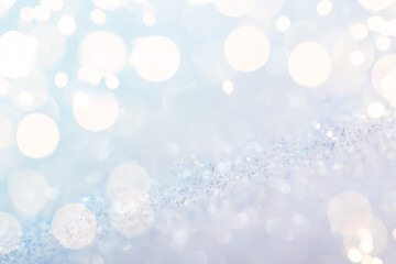 Shiny silver defocused glitter background with golden lights