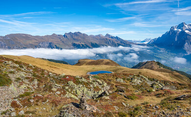 Landscape of Swiss alps and clouds above Grindelwald, Switzerland.