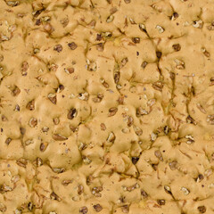 Texture of apple pie with walnuts. Close-up. Top view