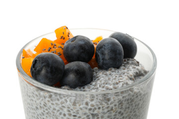 Glass of chia pudding with fruits isolated on white background