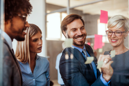 Happy success business people working, brainstoming together in office on meeting - Powered by Adobe