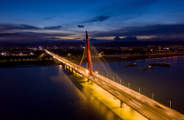 Modern bridge in the city at night