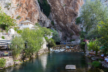 Beautiful view of the Dervish House under the rock in Blagaj. Bosnia and Herzegovina