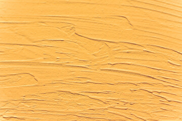 Orange texture concrete background. Marigold cement concrete wall.