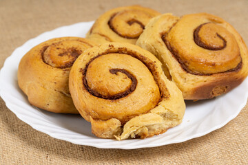 CInnamon Rolls on Box and Plate 
