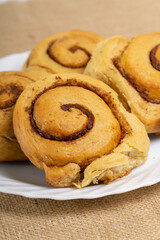 CInnamon Rolls on Box and Plate 