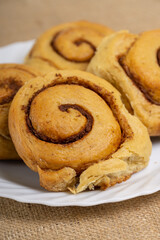 CInnamon Rolls on Box and Plate 