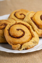 CInnamon Rolls on Box and Plate 
