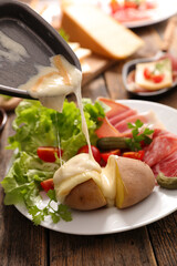 raclette cheese with potato and ham