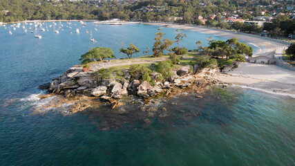 Aerial footage of a beautiful bay with yachts near the Mosman area. Australia
