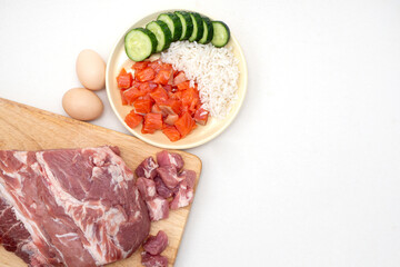 Pet dog food from natural ingredients. Raw meat, fish, vegetables. concept of a correct balanced and healthy nutrition for pet, flatly