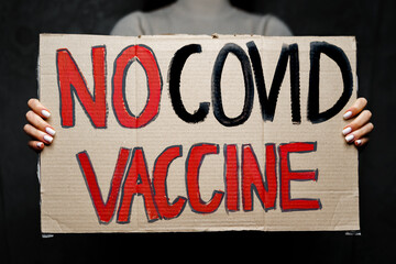 'No covid vaccine' protestive placard close up