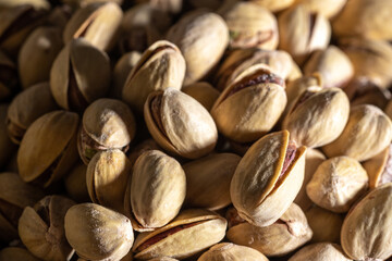 Pistachios closeup, nuts texture, kernels background