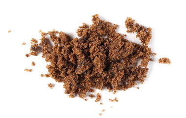 Muscovado sugar isolated on white background, top view