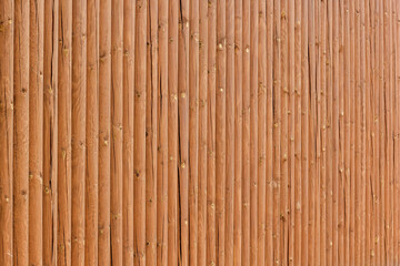 smooth background of many light brown round wooden boards. wood texture