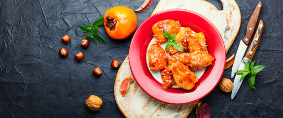 Pieces of caramelized persimmon.