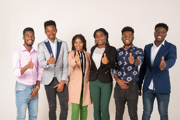 beautiful young african people on white background with hand gesture