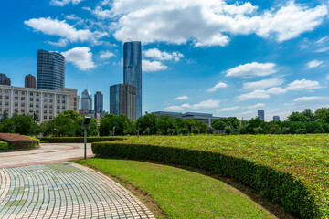 city park with modern building background in shanghai