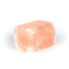 Piece of himalayan salt isolated on white.