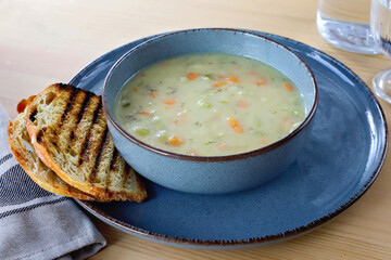 Bowl of delicious  creamy vegetable soup 
