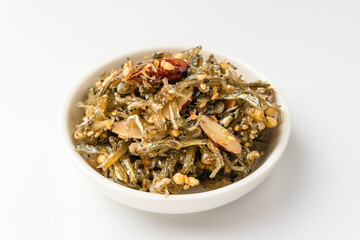 Stir-fried anchovies on white background