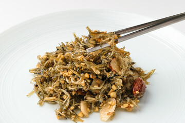 Stir-fried anchovies on white background