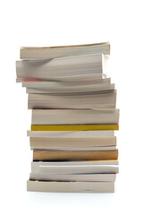 Closeup of books pile on white background