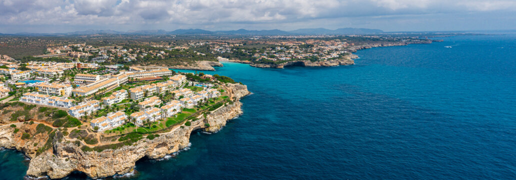 An aerial panorama of Cala Romantica on Mallorca island in Spain © Aliaksandr