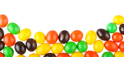 Colorful round candy isolated on white background. The view from the top.