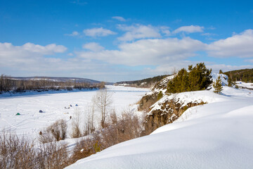The flow of the Tom river near the village of Old Balakhani is a popular place for Amateurs of winter fishing