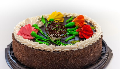 Biscuit cream cake closeup on white background