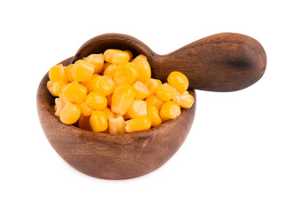 Canned sweet corn in wooden bowl and spoon, isolated on white background. Pickled corn.