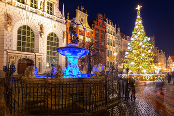 Neptune Fountain and a Christmas tree in the old town of Gdańsk. Poland