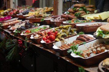 Nice street food shashlik, lavash, kebab, hachapuri and roasted potato on national Christmas Fair in Kiev, Ukraine