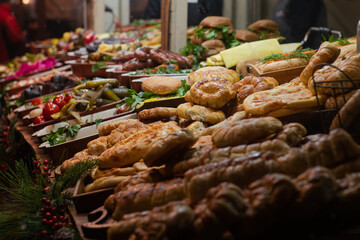 Nice street food shashlik, lavash, kebab, hachapuri and roasted potato on national Christmas Fair in Kiev, Ukraine