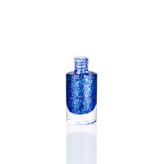 Blue glittering nail polish in glass bottle on white background isolated close up, opened dark blue sequin varnish, bright shiny lacquer, sparkling enamel, beautiful shimmer gel, beauty cosmetic