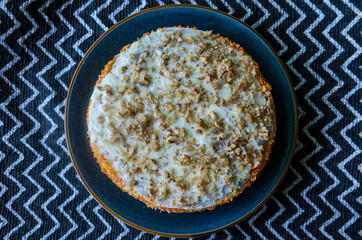 Delicious carrot cake on minimalist abstract geometric background