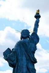 Fototapeta premium Back of the Statue of Liberty in the Sena river of Paris, France