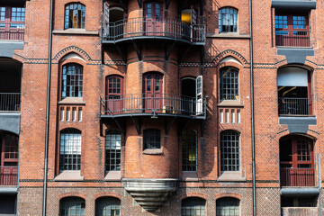 Fototapeta na wymiar Facade of an old warehouse as background in Hamburg, Germany