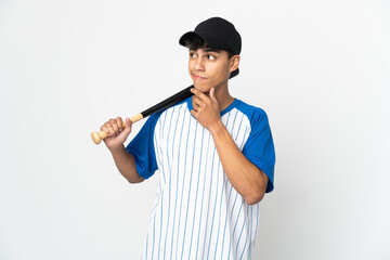 Man playing baseball over isolated white background having doubts and thinking