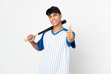 Man playing baseball over isolated white background with thumbs up because something good has happened
