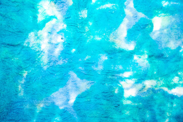 Fototapeta na wymiar Blue dyed fabric background