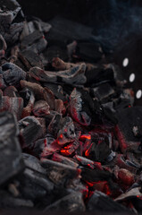 Red hot coals in the grill