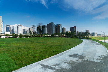 Obraz premium city park with modern building background in shanghai
