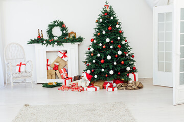 Christmas tree fireplace with gifts decor garland interior new year