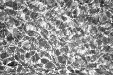 Swimming pool water surface.  Black and white
