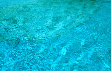 Swimming pool water surface.