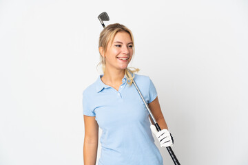 Young Russian woman isolated on white background playing golf