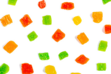 Candied fruit colorful pattern isolated on white background. Energy healthy diet meal. Papaya mango sweet dried fruits wallpaper, top view